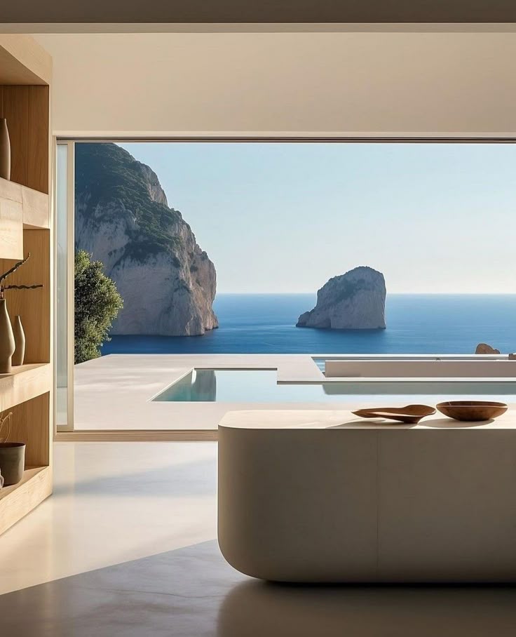 Modern villa exterior with pool and panoramic ocean view